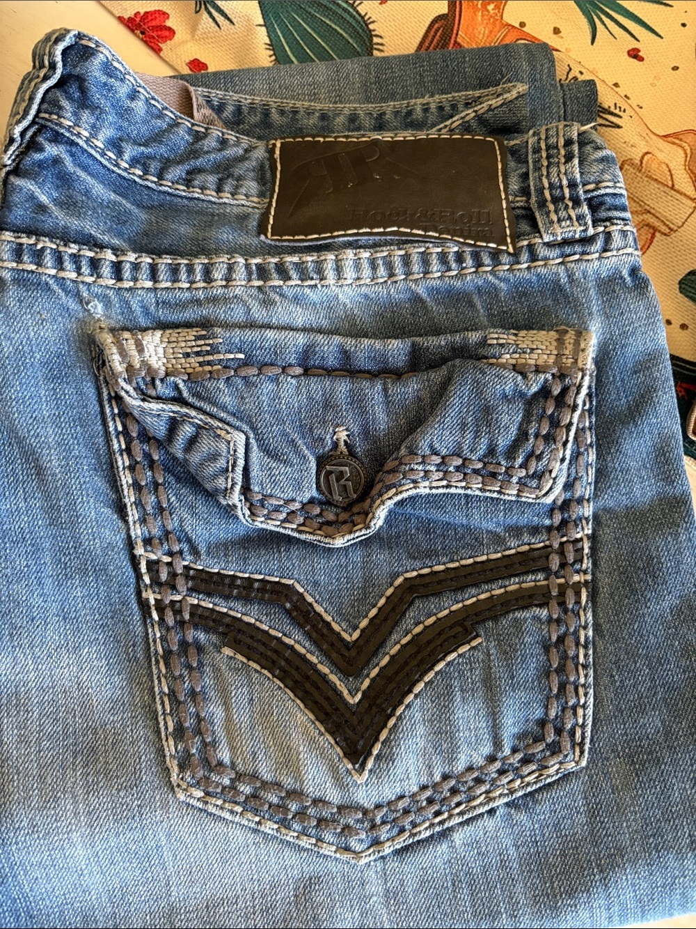 Men's Light Blue Bootcut Jeans with Embroidered Back Pocket